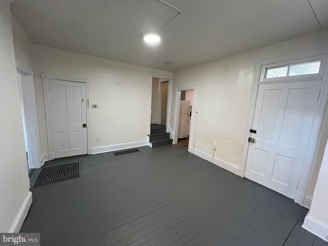 foyer featuring dark hardwood / wood-style flooring