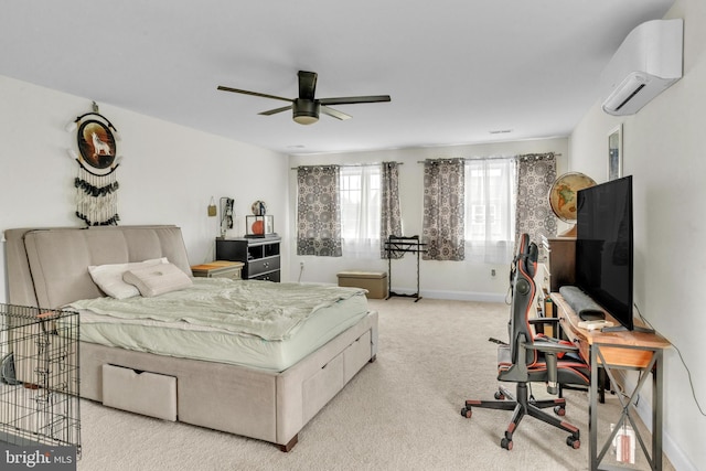 carpeted bedroom featuring ceiling fan and a wall mounted AC