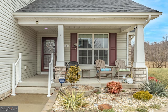 property entrance with covered porch