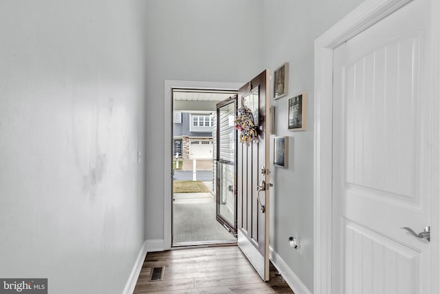 doorway with light hardwood / wood-style floors