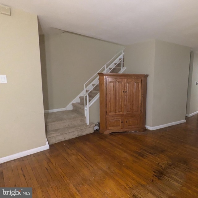 interior space with dark wood-type flooring