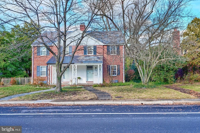 view of front of home with a front yard