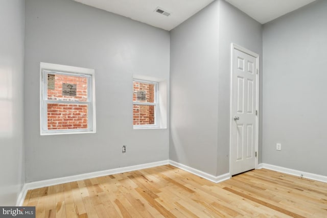 empty room featuring hardwood / wood-style floors