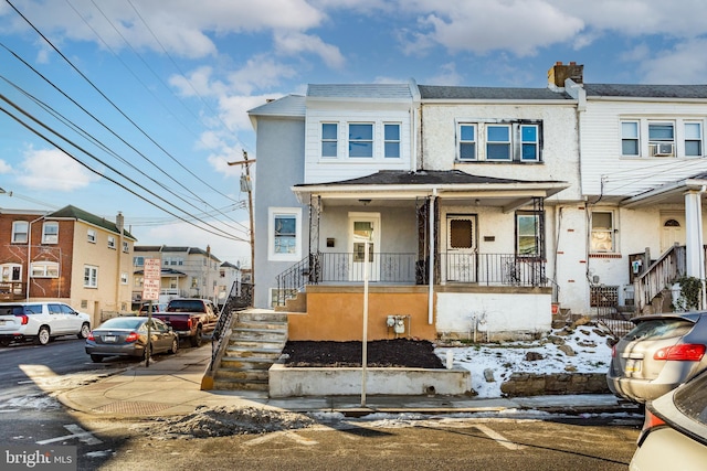 multi unit property featuring covered porch