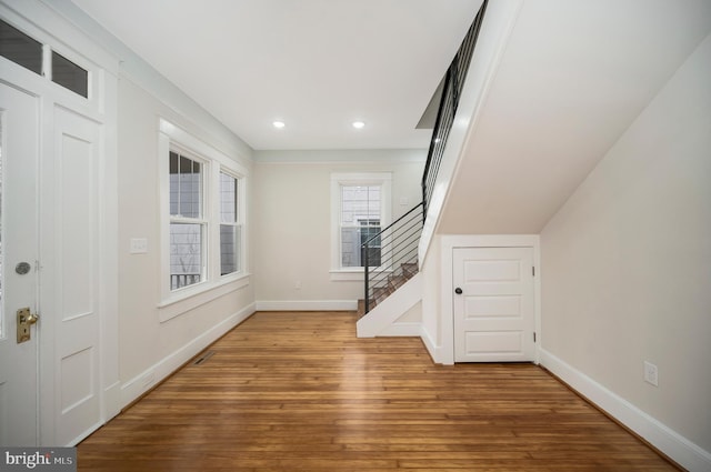 foyer entrance featuring wood-type flooring