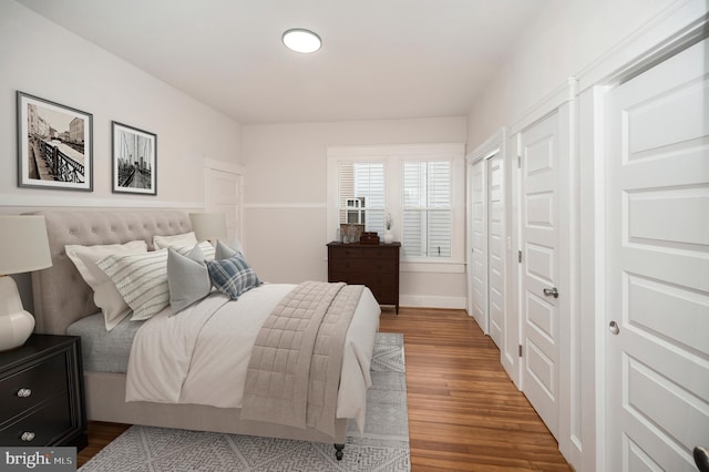 bedroom featuring dark hardwood / wood-style floors