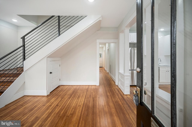 interior space with hardwood / wood-style floors