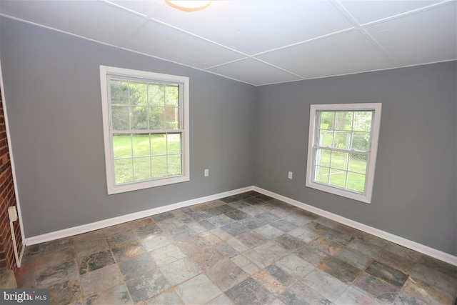 unfurnished room with plenty of natural light