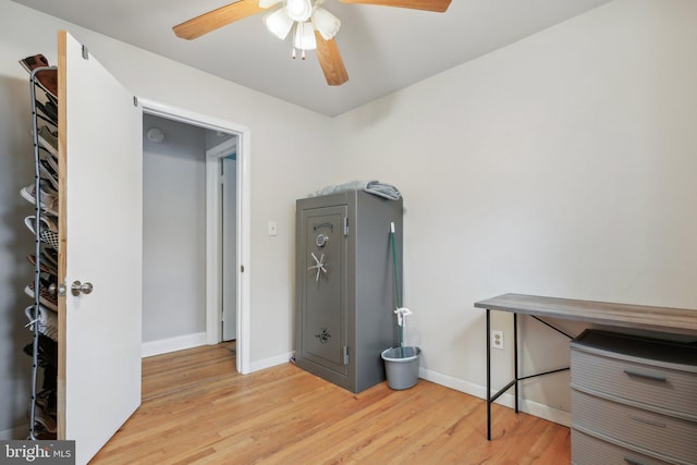 misc room featuring light hardwood / wood-style flooring and ceiling fan