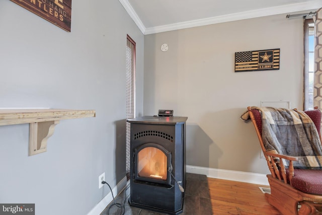 details featuring ornamental molding, wood-type flooring, and a wood stove