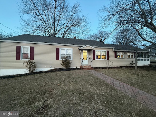 view of front of property with a front yard