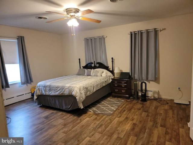 bedroom featuring dark wood-type flooring, a baseboard radiator, and ceiling fan