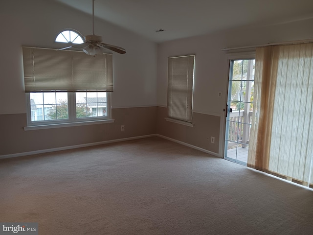 unfurnished room with carpet floors and ceiling fan