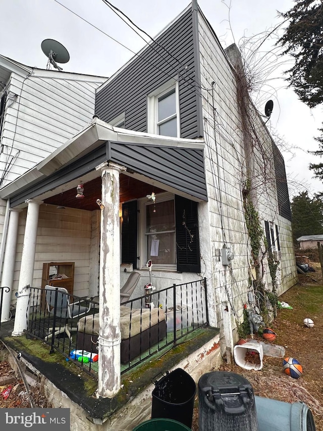 view of home's exterior with covered porch