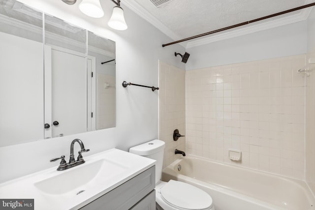 bathroom featuring toilet, bathtub / shower combination, ornamental molding, and a textured ceiling