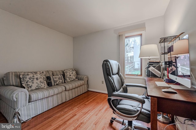 home office featuring light hardwood / wood-style flooring