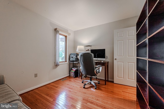 office area featuring light hardwood / wood-style floors