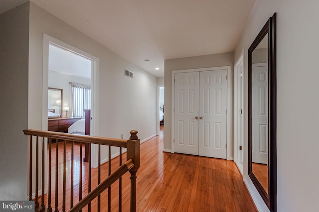 hall featuring light hardwood / wood-style flooring