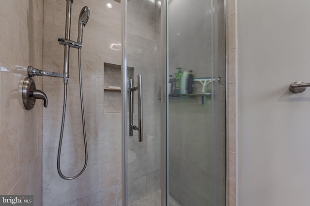 bathroom with an enclosed shower