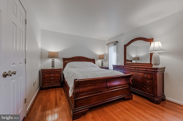 bedroom featuring hardwood / wood-style flooring