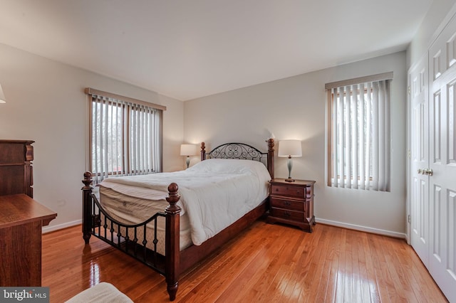 bedroom with light hardwood / wood-style floors