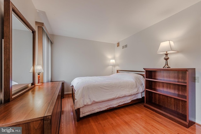 bedroom featuring light hardwood / wood-style flooring