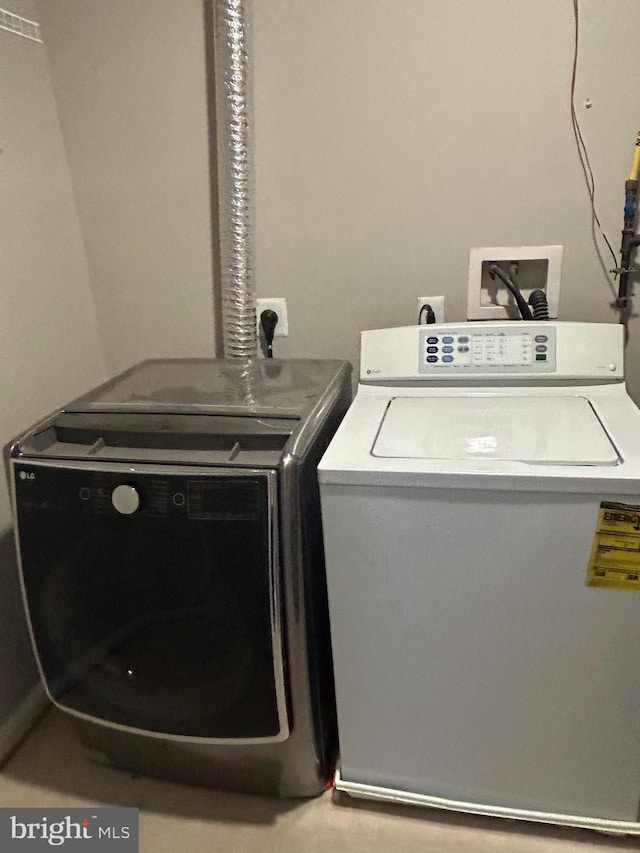 laundry room featuring washer and dryer