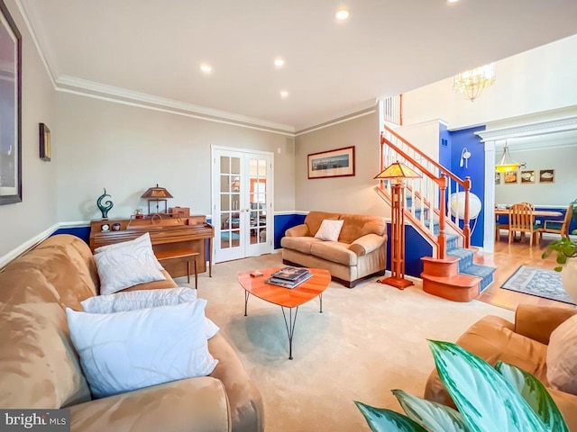 carpeted living room featuring crown molding and french doors