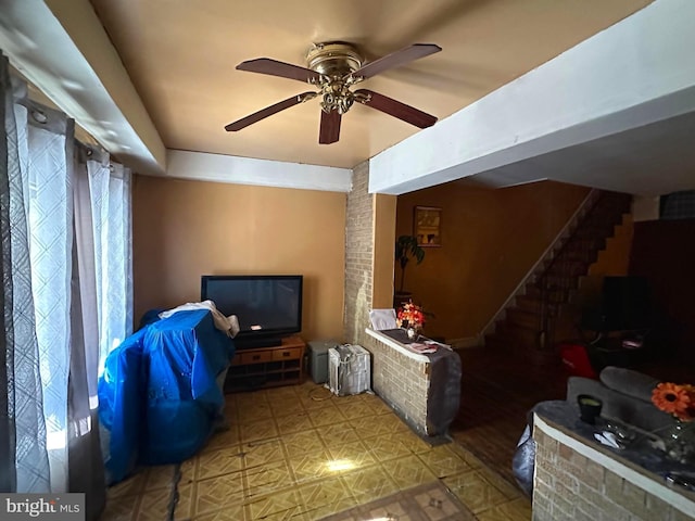 living room with ceiling fan