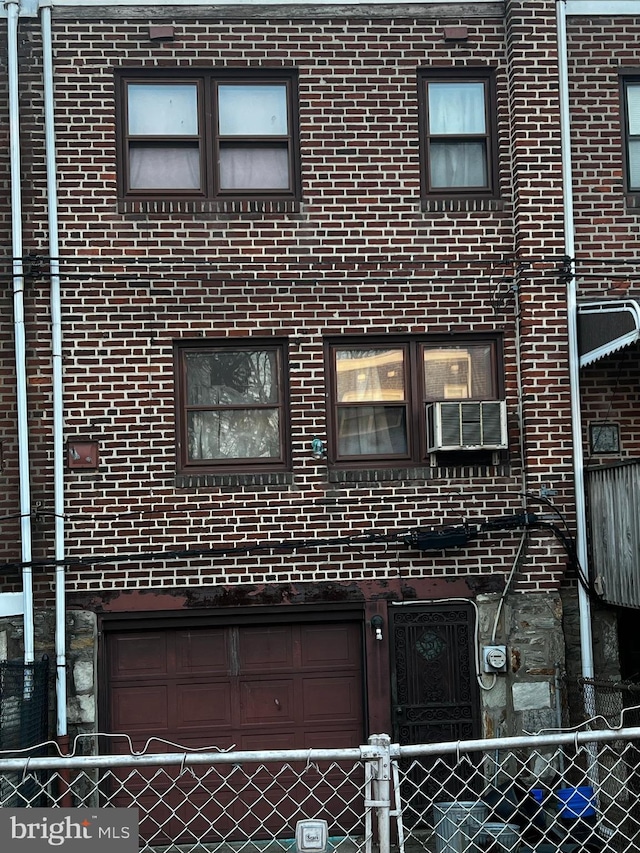 view of building exterior featuring a garage