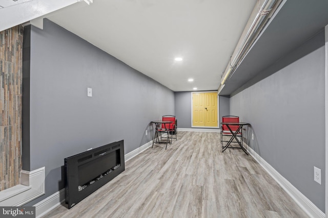 living area with light hardwood / wood-style floors