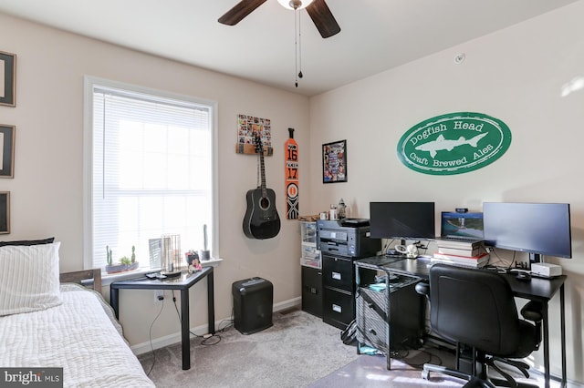 interior space with light carpet and ceiling fan