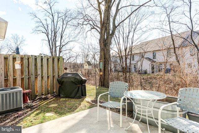 view of patio / terrace featuring grilling area and central air condition unit