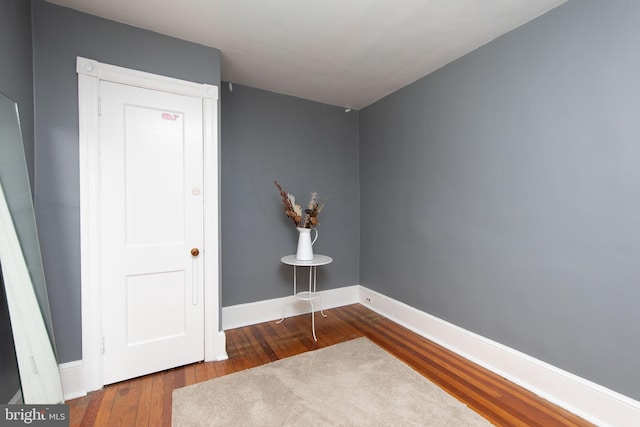 interior space with dark hardwood / wood-style floors