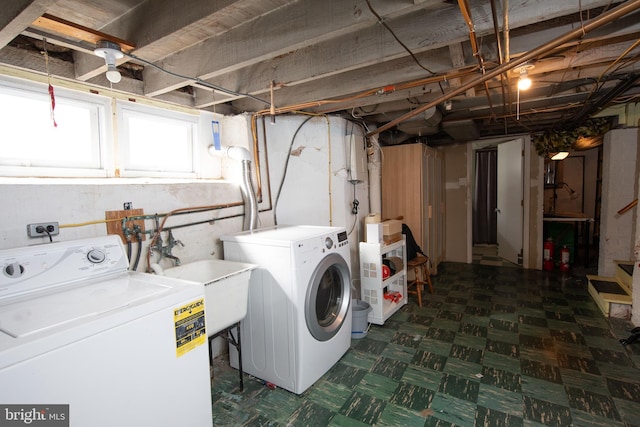 laundry room featuring washing machine and clothes dryer