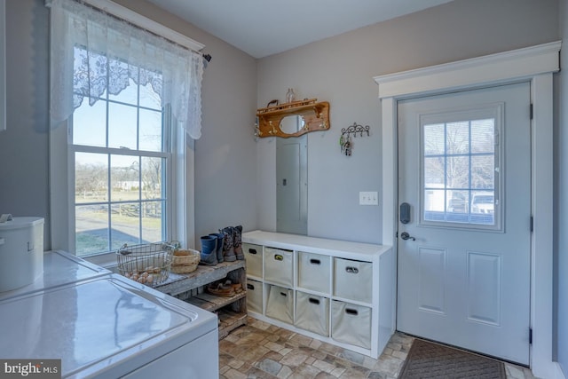 interior space with washer and dryer and a wealth of natural light