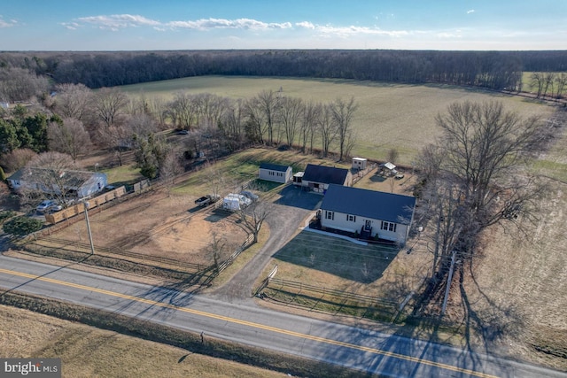 birds eye view of property with a rural view