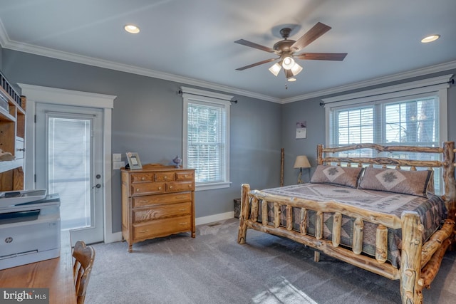 bedroom with ornamental molding and carpet