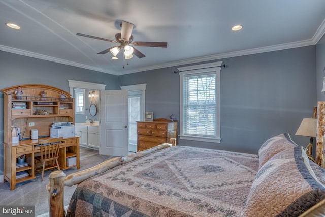 bedroom featuring crown molding, carpet flooring, ensuite bathroom, and ceiling fan