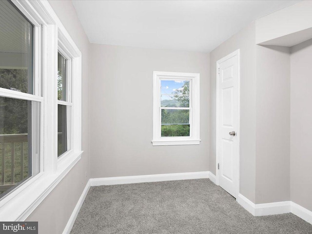 view of carpeted spare room