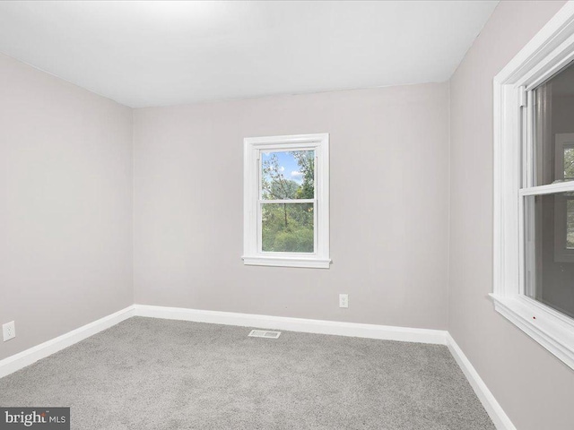 view of carpeted spare room