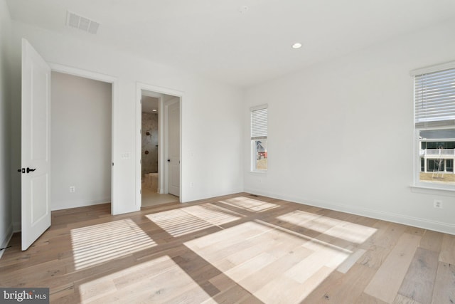 unfurnished bedroom featuring light hardwood / wood-style floors