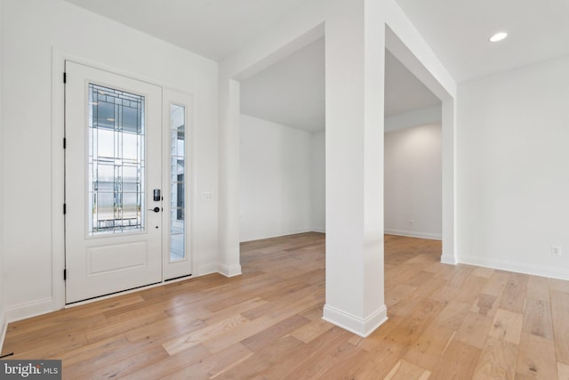 foyer entrance featuring light wood-type flooring