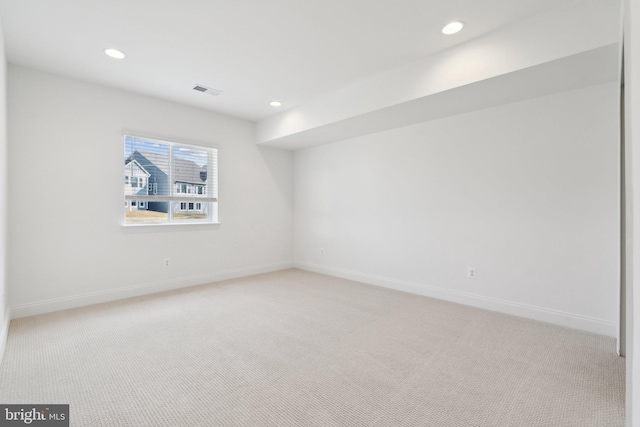 view of carpeted spare room