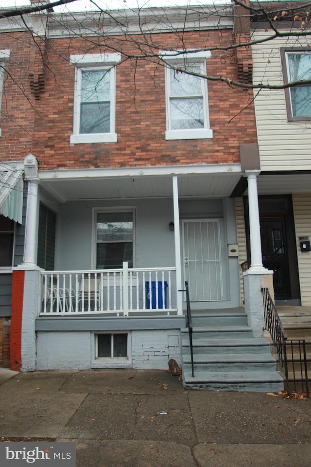 view of front of home featuring covered porch