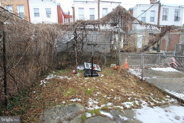 view of yard covered in snow