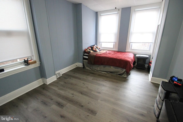 bedroom featuring dark hardwood / wood-style floors