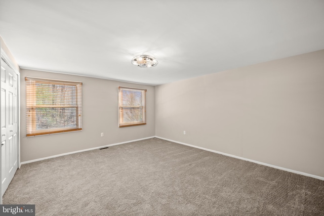 interior space with carpet flooring and plenty of natural light