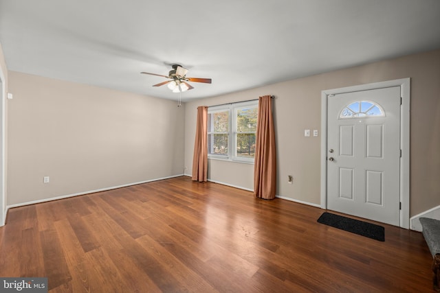 entryway with ceiling fan and wood-type flooring