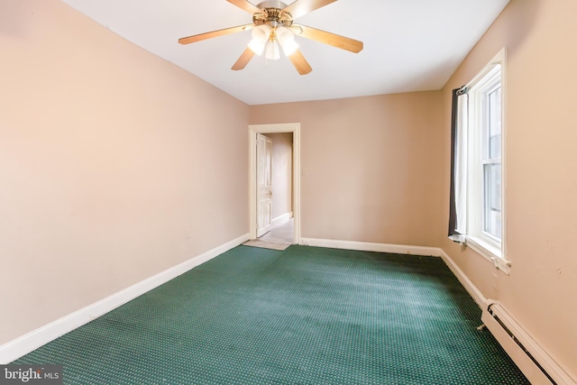 443 Manor St, Lancaster, PA 17603 - carpeted empty room featuring a baseboard radiator, a ceiling fan, and baseboards